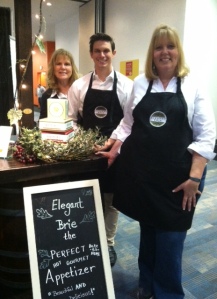 Elegant Brie booth at SF Fancy Food Show 2014. Crew includes of Leslie (The Big Cheese) and Linda (Chief Cheese Officer).
